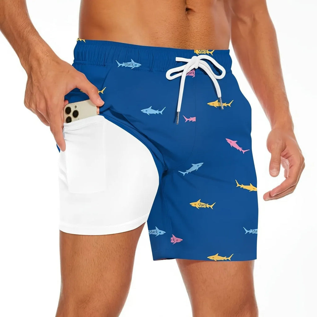 Men's black beach shorts with a shark graphic and a white drawstring waist