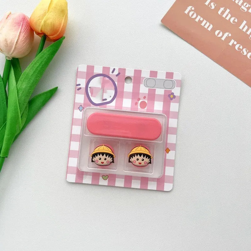 Plastic cartoon-style magnetic data cable fixer clip on a desktop