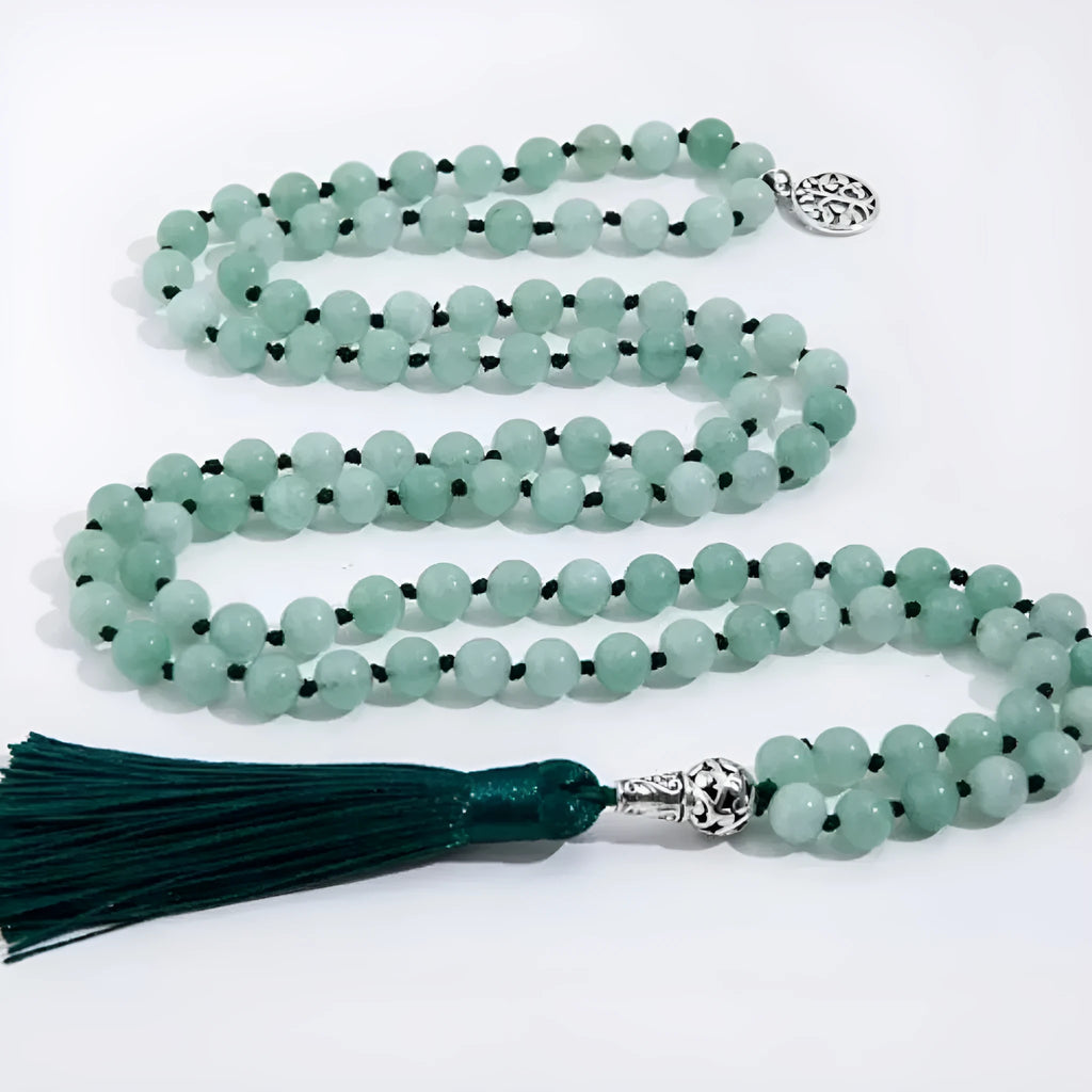 Handmade long necklace with 108 knotted 8mm natural stone beads in geometric shapes.