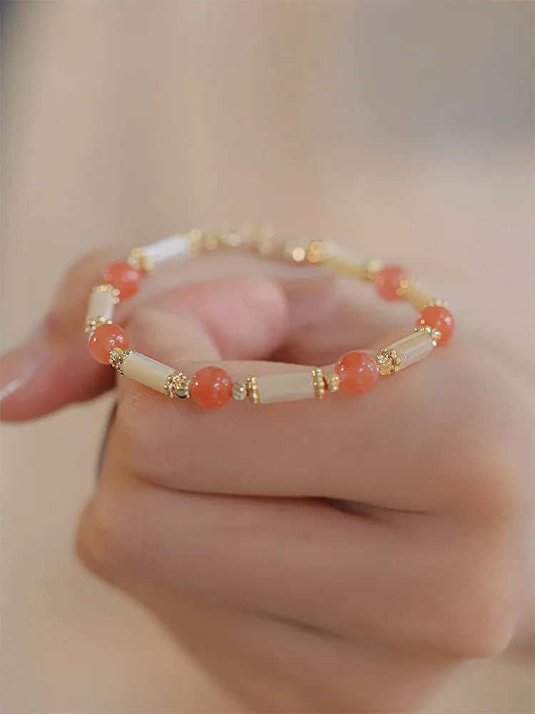 Women's bamboo joint Hetian jade bracelet in 6mm size showing natural stone beads