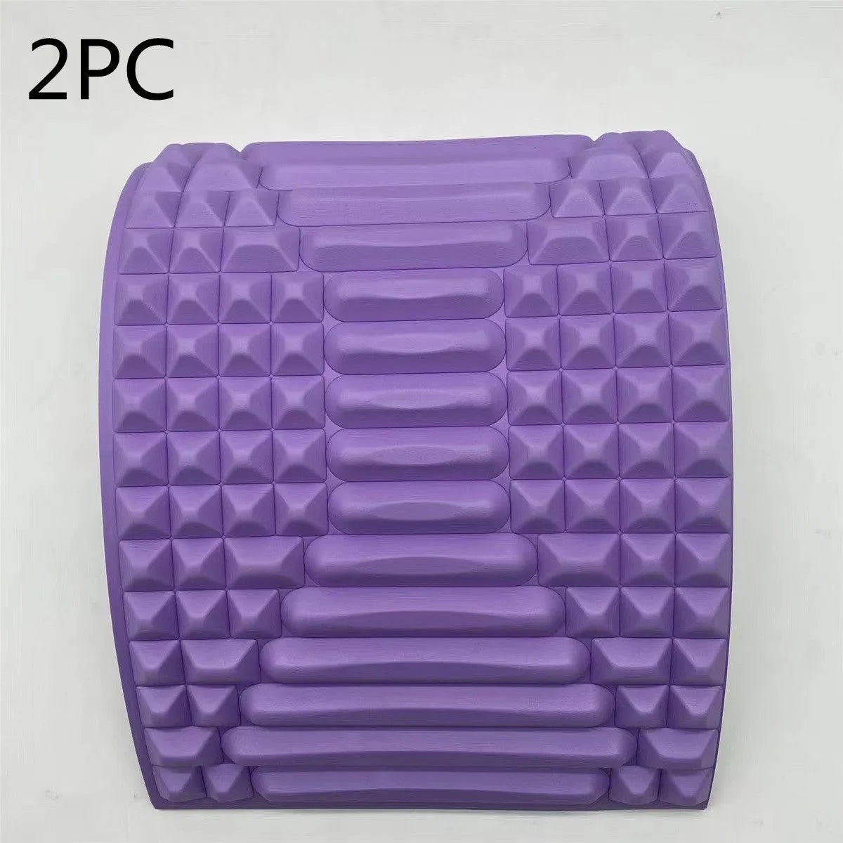 Blue back stretcher pillow for lumbar and neck support on a grey background.