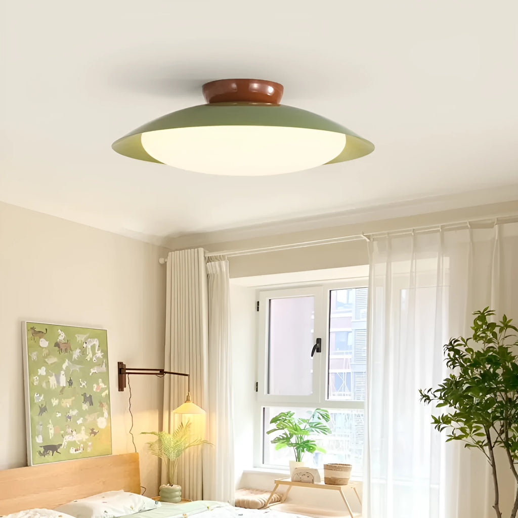 Modern minimalist flying saucer ceiling lamp in cream yellow colour with iron shade.