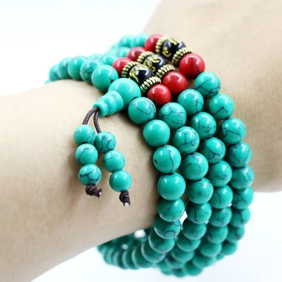 Turquoise Tibetan bracelet with 108 polished beads in synthetic stone