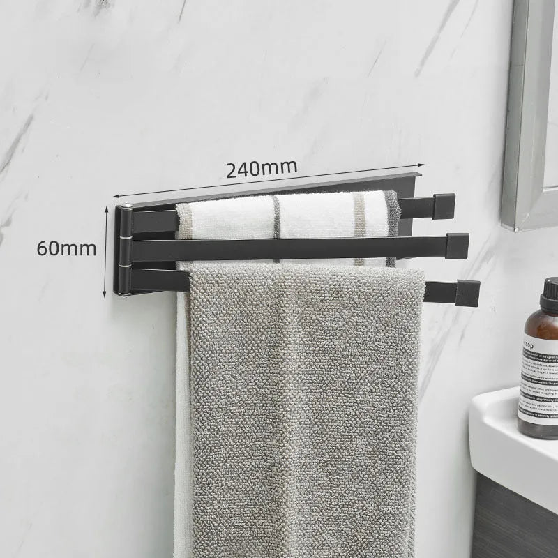 Nordic style black folding towel rack mounted on a bathroom wall with non-perforated installation.