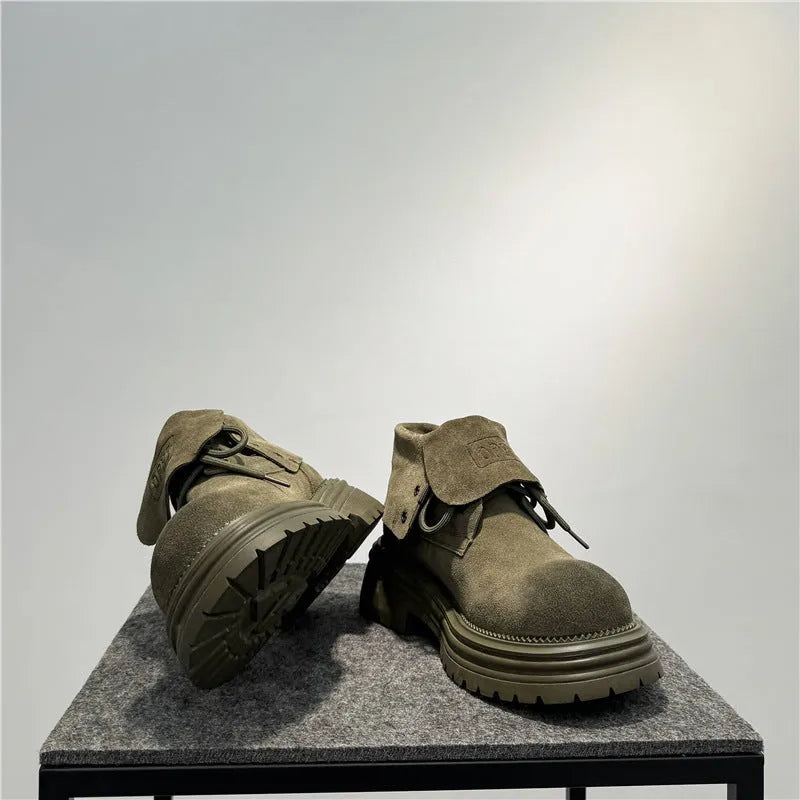 Retro distressed suede work boots with thick soles and sewing line detailing in camel colour