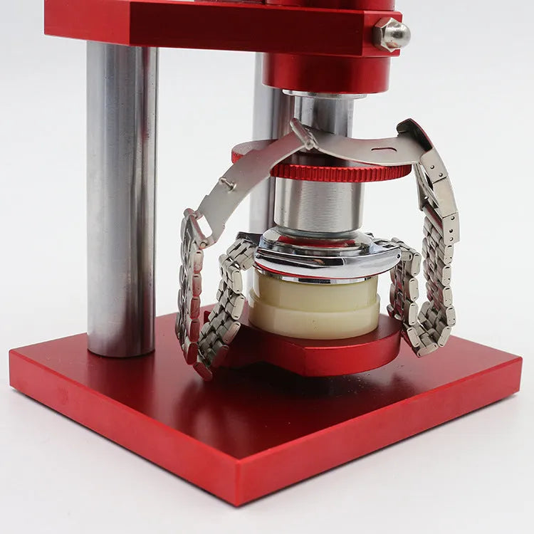 Spiral cap presser watch repair tool with a set of 20 plastic moulds for watch back covers.