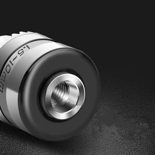 100 angle grinder conversion chuck adapter for drill bits on a workbench.