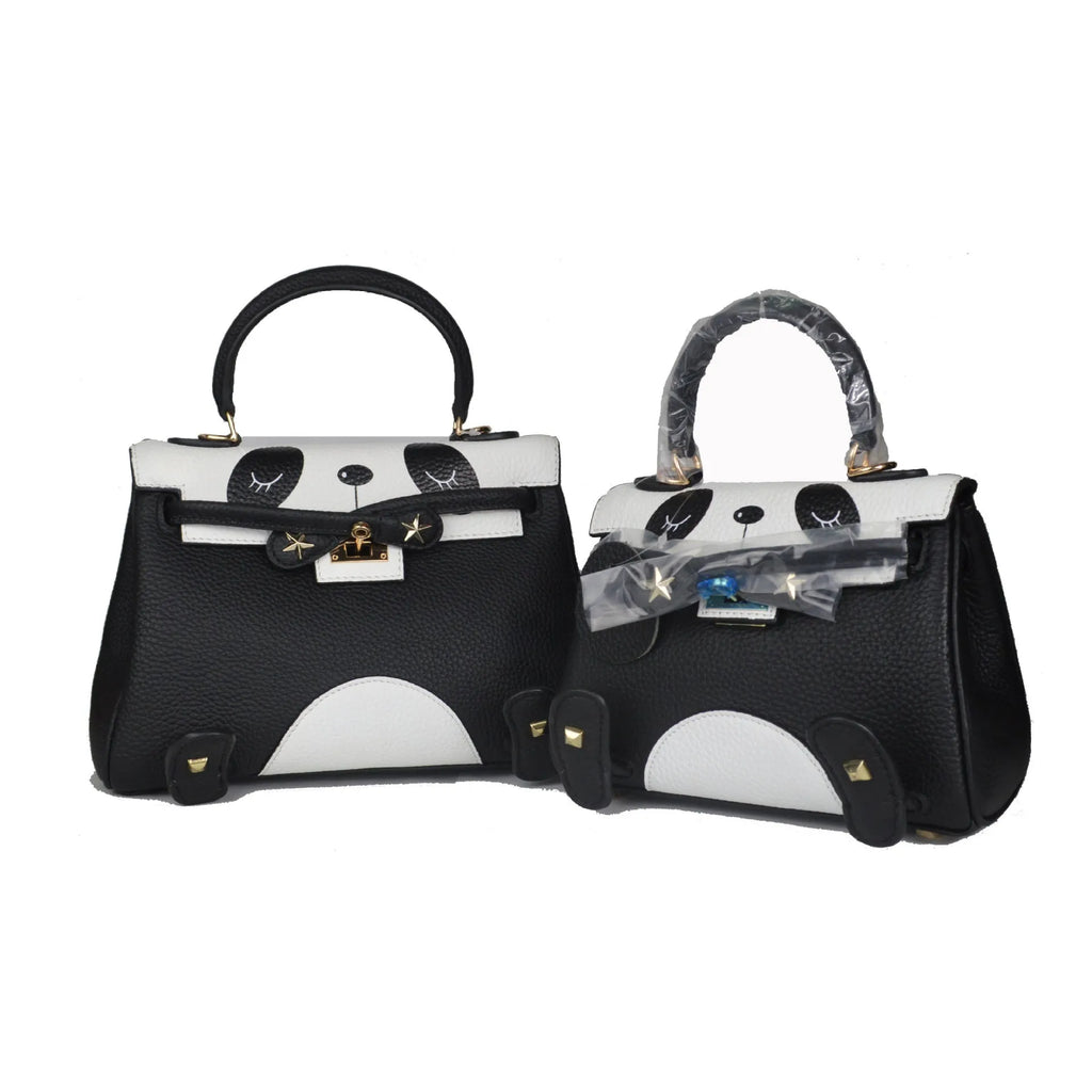 Black and white panda print on a structured horizontal square cowhide leather handbag with top handles.