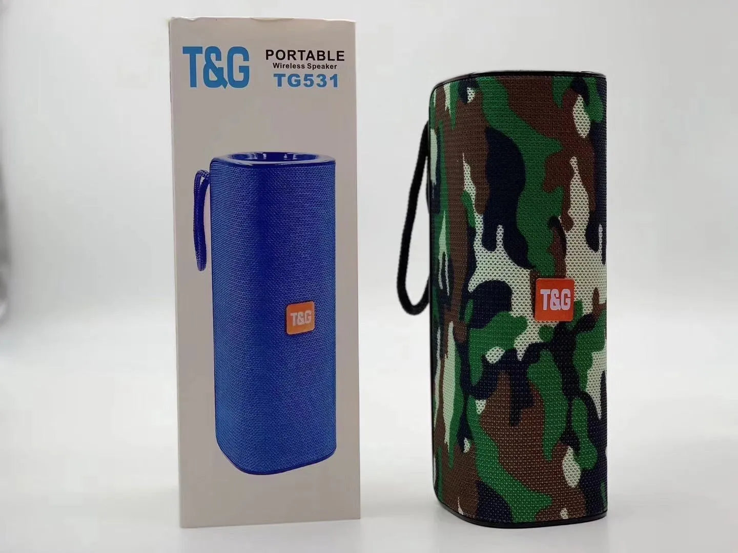 Cloth wireless Bluetooth speaker in multiple colours showing front grill and control buttons.