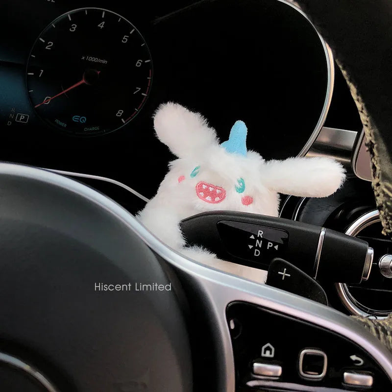 Cute cotton car decoration doll showing a pilot dog design on a dashboard.