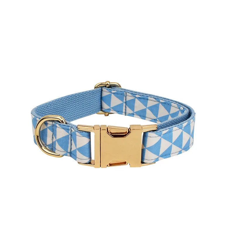 Blue cloth dog vest set with matching collar, rope leash, and bow accessory on dog mannequin