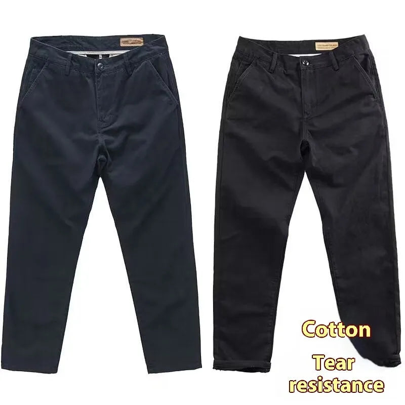 Men's slim straight-leg casual trousers in a washed cotton-polyester blend fabric.