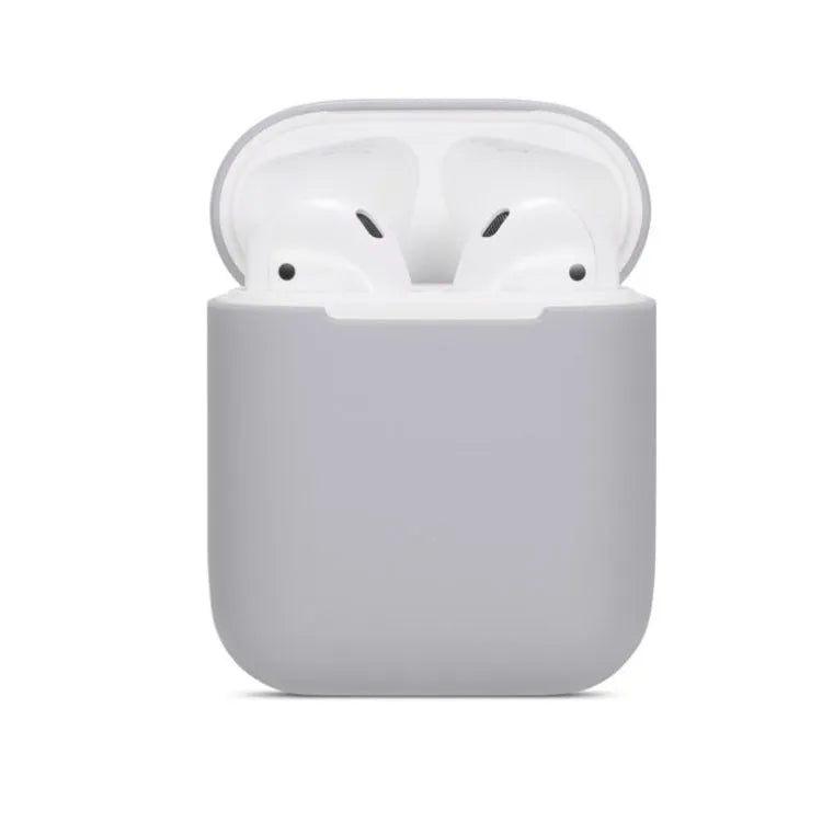 Soft silicone protective case for Apple AirPods charging case in multiple colours including black, grey, pink, and blue.