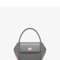 Women's leather wing tote bag in cow leather with buckle detail and cross-body strap