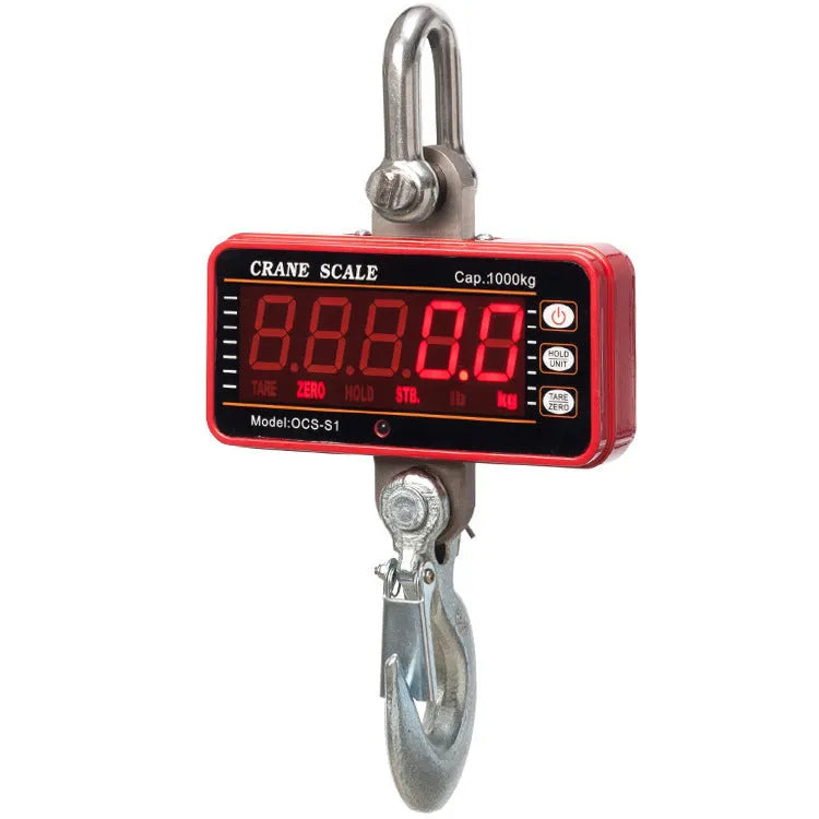 Orange electronic crane scale with digital display, shown suspended from a hook.