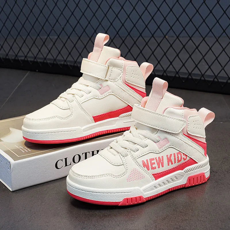 Children's coloured buckle sneakers with PU upper and rubber sole on a neutral background.