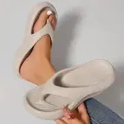 Women's thick-soled EVA flip-flops in black, white, or grey colours with non-slip sole design