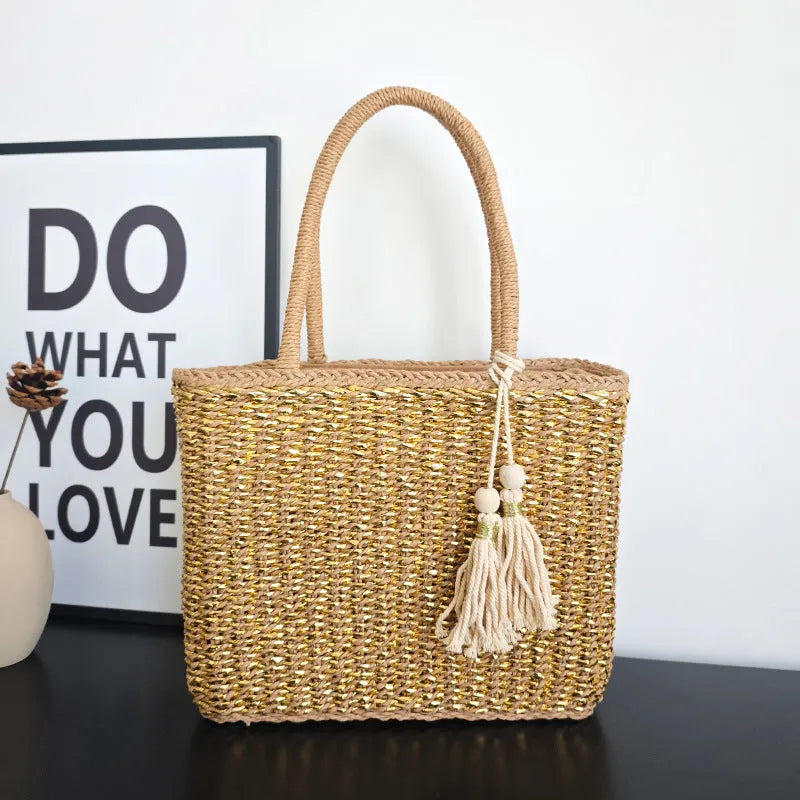 Handmade woven paper straw bag with double shoulder straps in gold and natural tones