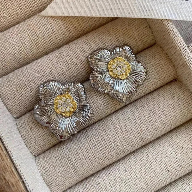 Pair of copper gardenia stud earrings with textured petals in a two-tone electroplated finish