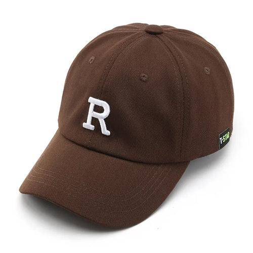 Adjustable cotton baseball cap with embroidered letter R in beige colour, dome style, unisex design