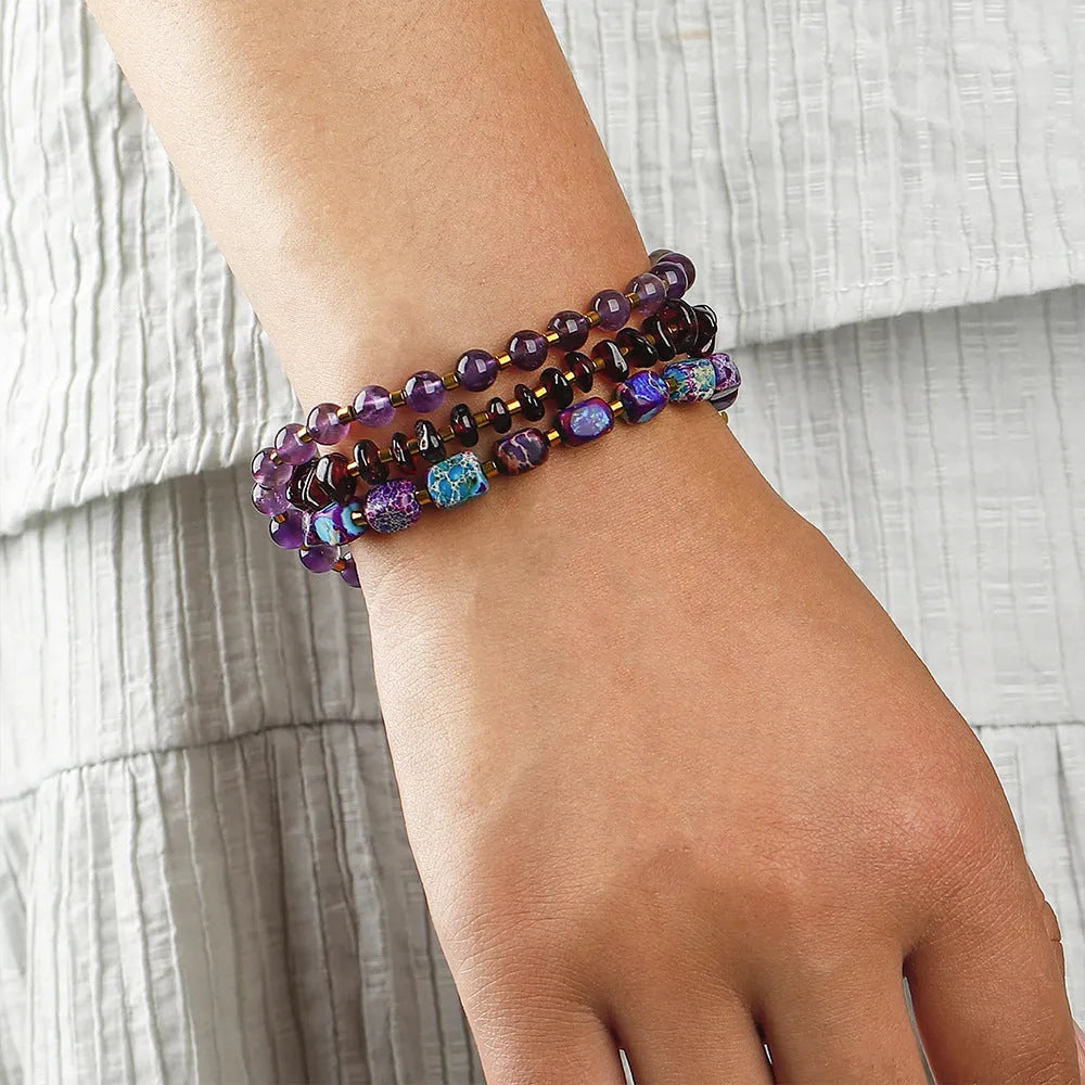 Purple amethyst and garnet stone bead bracelet with geometric design and manual craft details