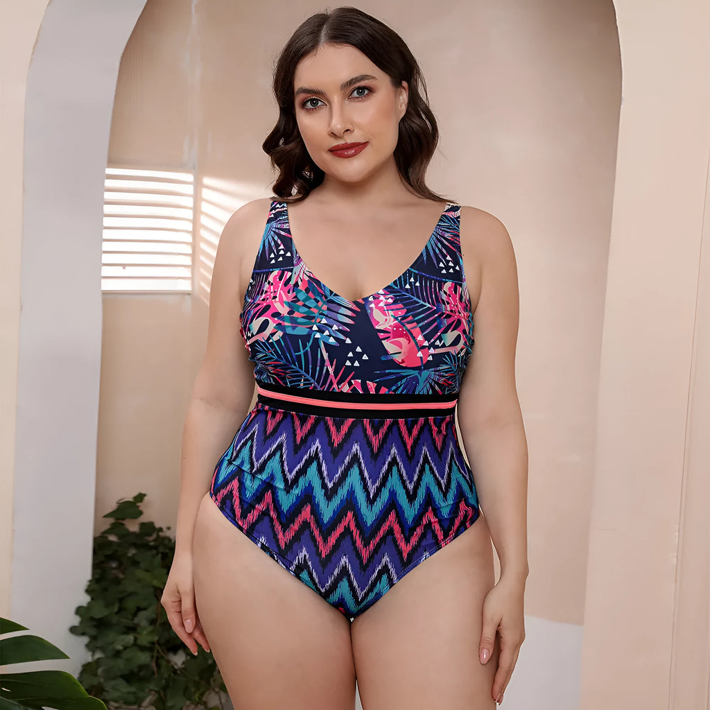 Women's blue striped one-piece swimsuit with spaghetti straps on a mannequin.