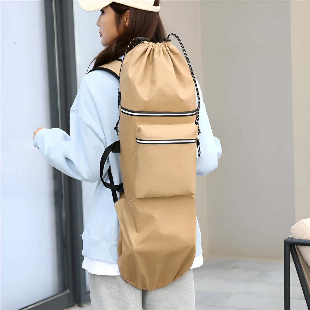 Black waterproof nylon bag for carrying a skateboard and fishing rod, shown with yoga mat.