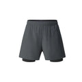Men's black double-layer running shorts with an inner liner, shown on a size chart.