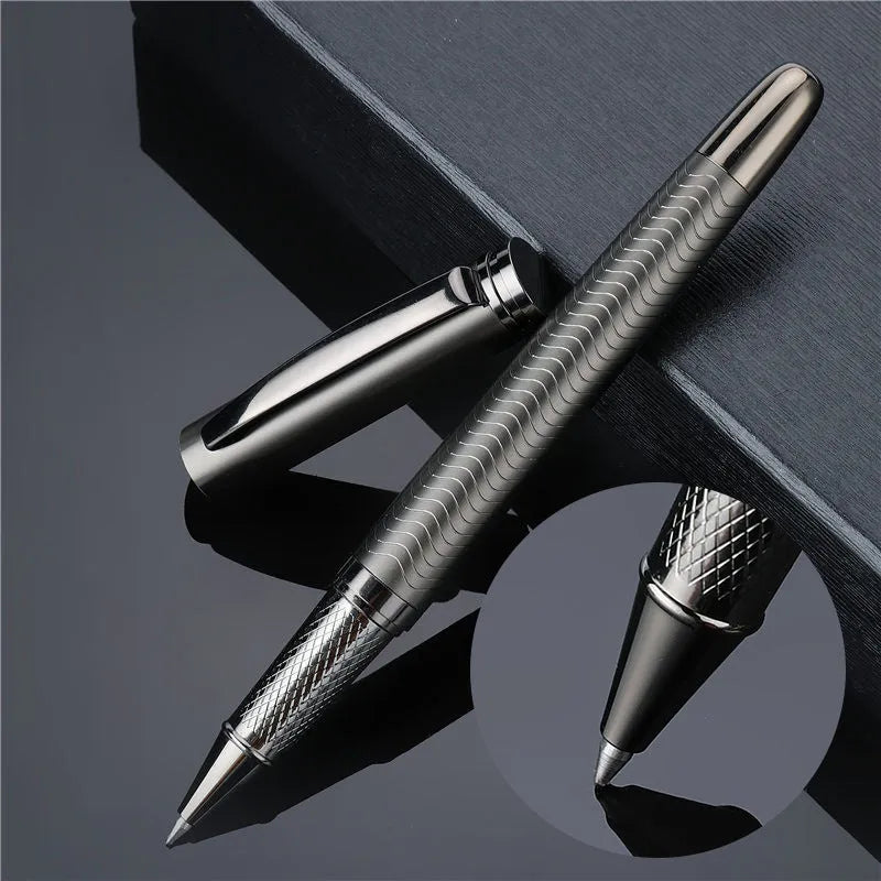 Fog gun grey metal signature pen with bullet nib and 0.5mm line width on dark table