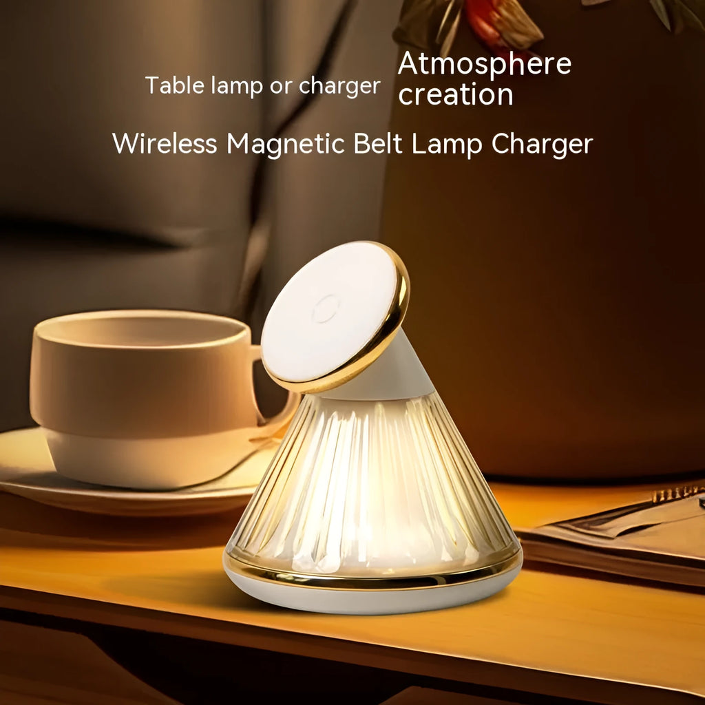 Champagne gold night table lamp with integrated magnetic wireless charging seat on its base.