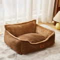 Coffee coloured removable cover dog and cat bed cushion showing raised edge, with S size 45x50cm dimensions