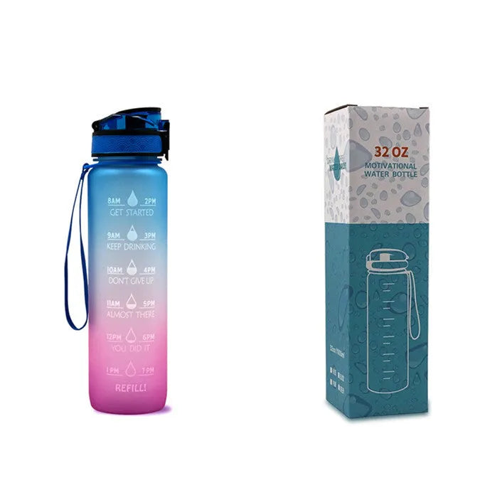 Blue and red gradient 1-litre Tritan sports water bottle with time markers, flip-top lid, and wrist strap.