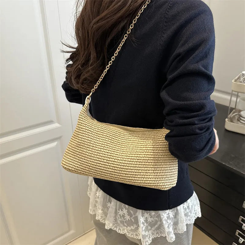 Straw woven beach shoulder tote bag in black colour with polyester lining and sandwich pockets