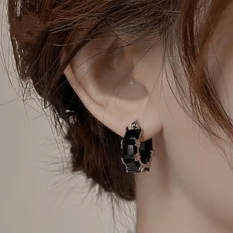 Geometric U-shaped women's earrings with zircon stones and gold plating