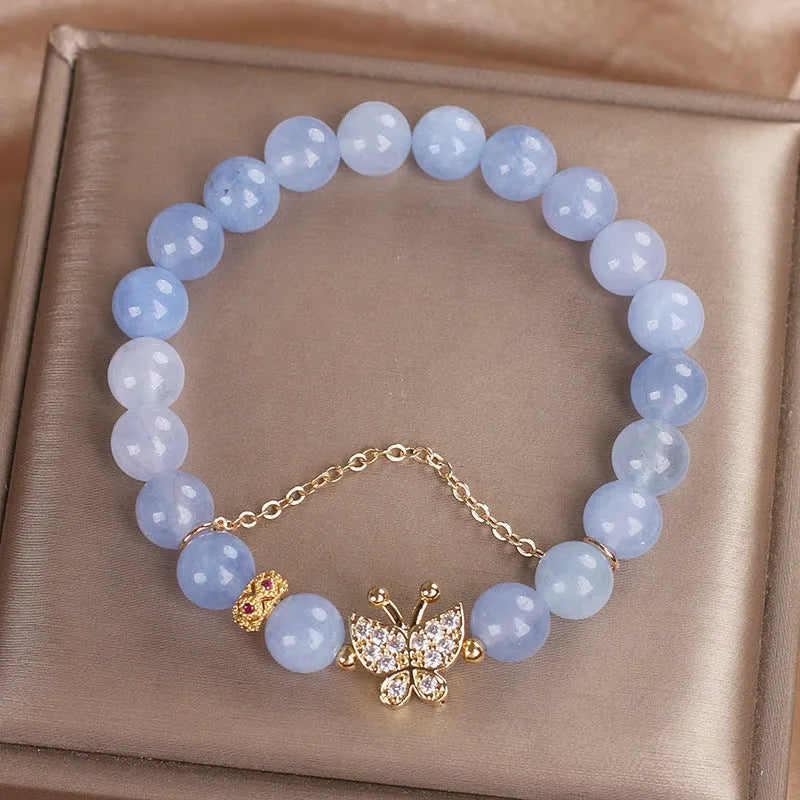 Sky blue aquamarine butterfly crystal bracelet with pearls and rhinestones, 17cm length