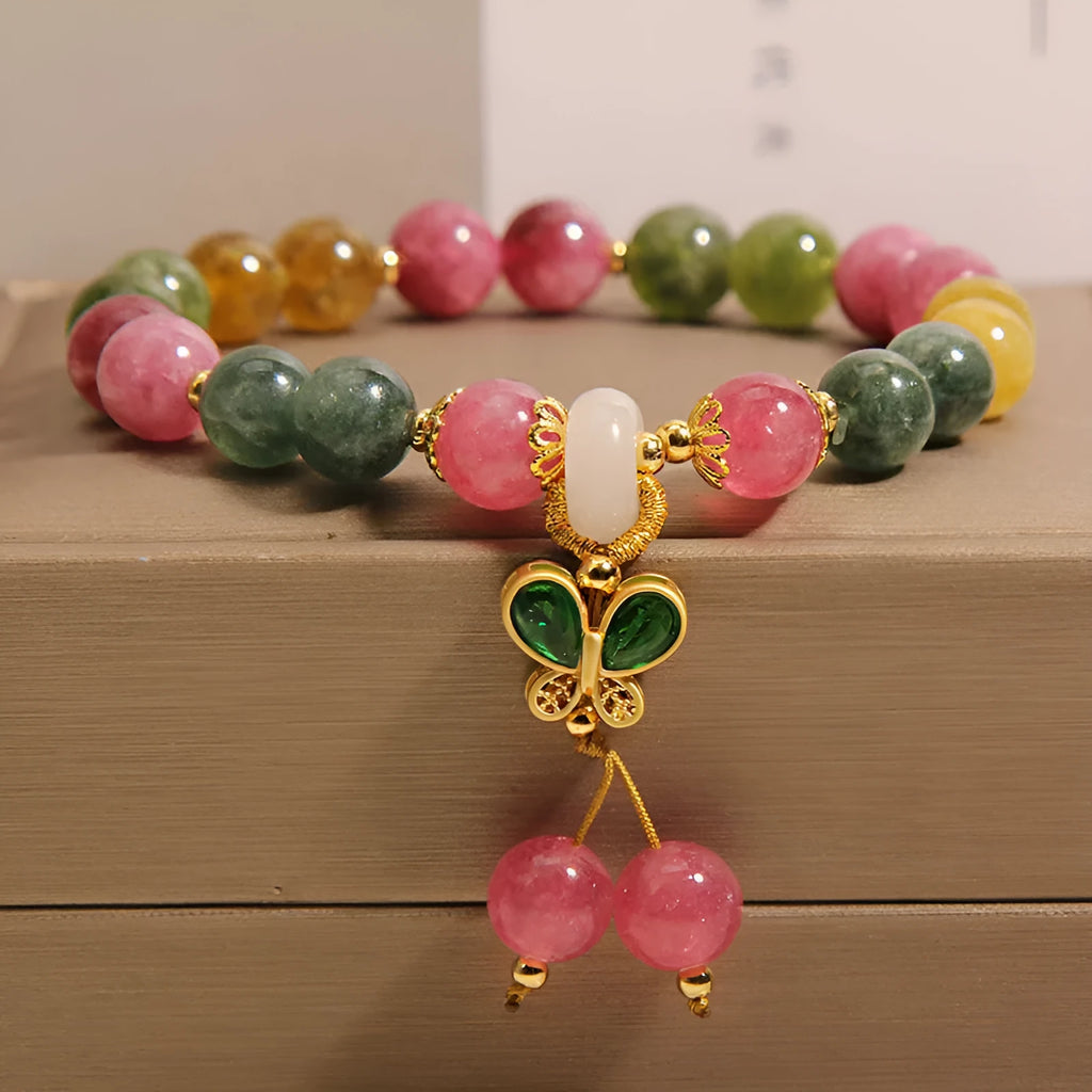Women's tourmaline butterfly pendant bracelet with natural jade colour stones and rhinestone accents