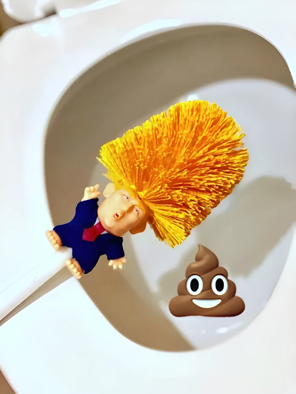 Yellow plastic Donald Trump novelty toilet brush with hanging slot, 40cm length