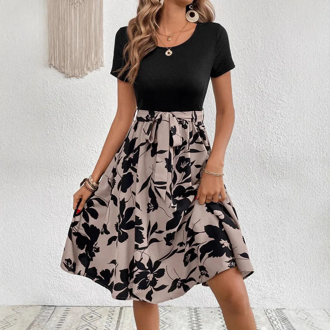Women's khaki A-line dress with floral printing and a shoulder strap detail