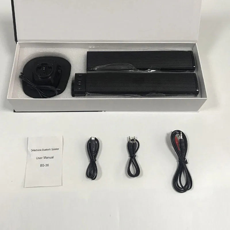 Black foldable split TV Bluetooth speaker with plastic housing showing speaker grilles and control buttons