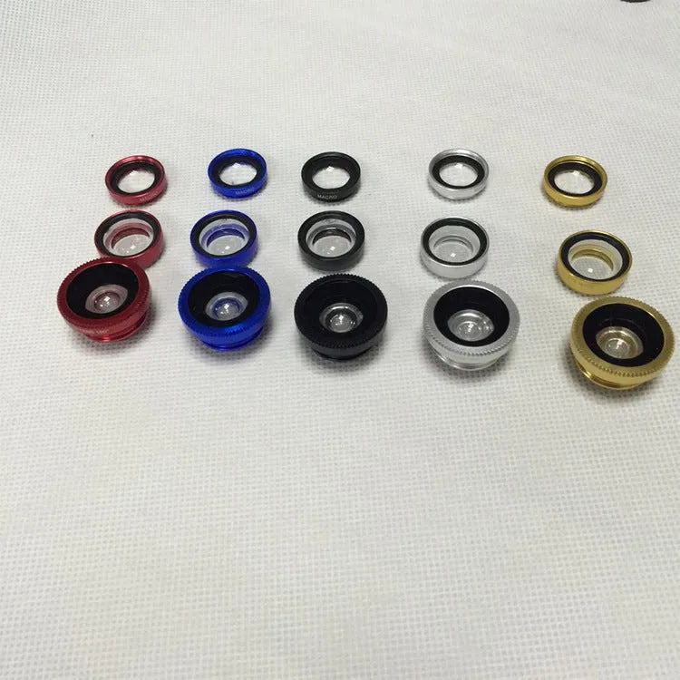 Three-in-one fisheye wide-angle macro clip-on lens kit for mobile phones in various colours.