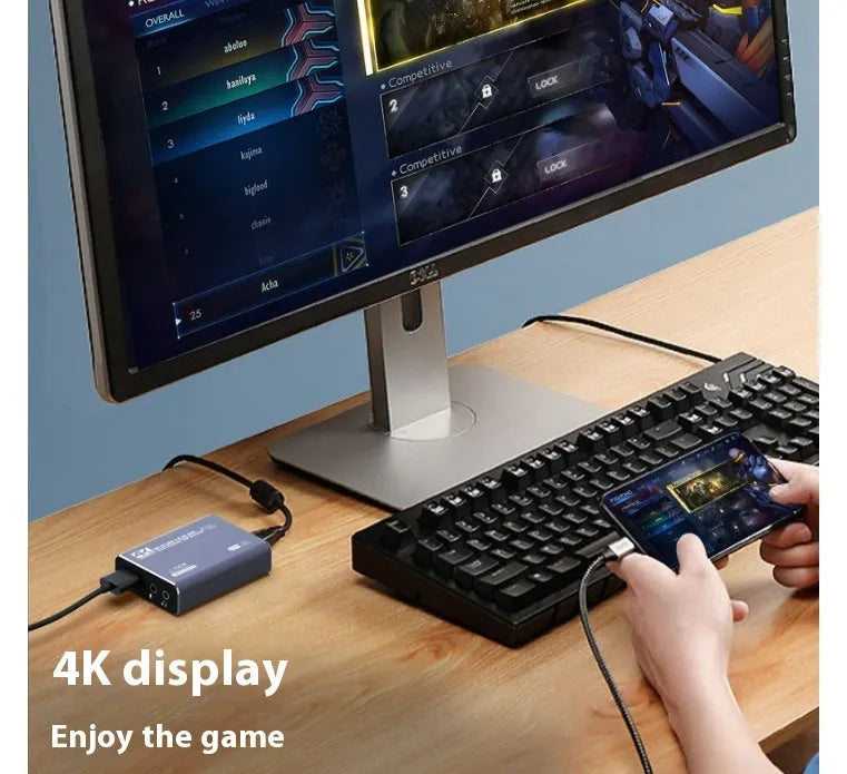 Black 4K gaming set-top box with MS2131 chip for 1080 resolution playback and audio recording.