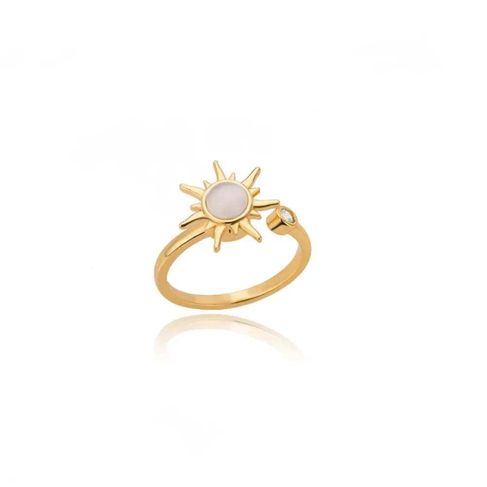 Geometric rotatable ring with adjustable opening in gold electroplated finish on copper base