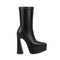 Women's black platform booties with thick super high heel and short stout heel