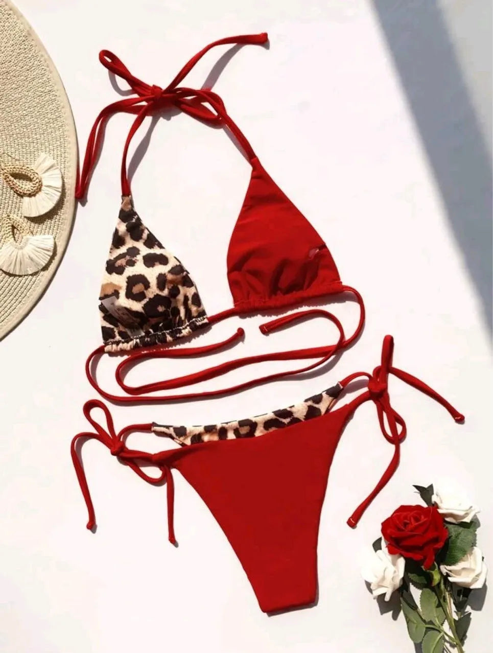 Women's leopard print bikini swimsuit with halter neck and lace-up detailing