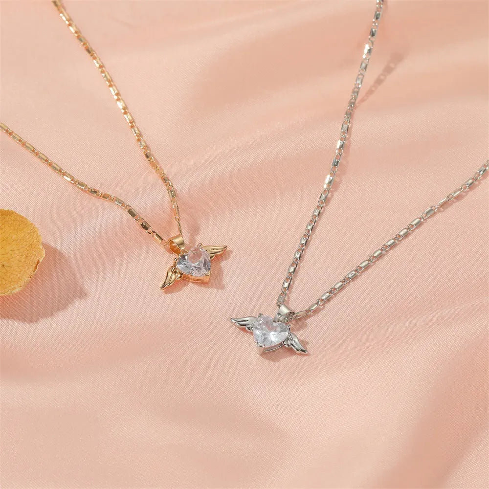 Heart wings necklace for women, copper pendant in gold finish, love themed jewellery