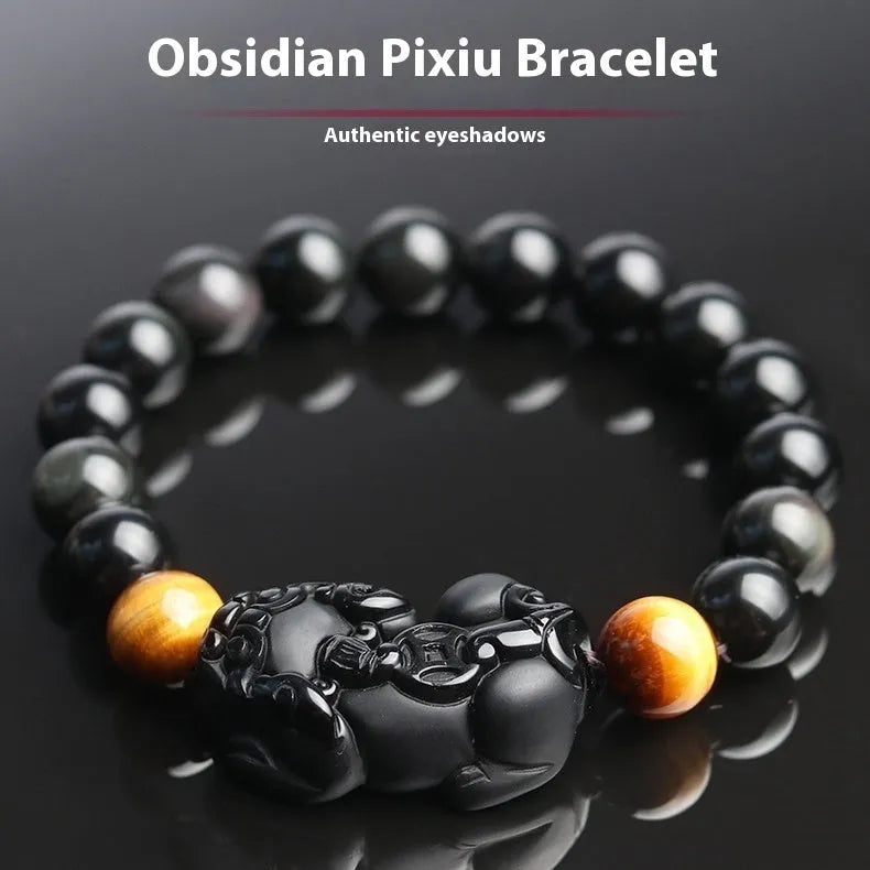 Black obsidian crystal Pi Xiu bracelet with ethnic styling and spiritual symbolism