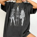 A loose-fit cotton t-shirt with short sleeves and a round neck, shown in various colours.