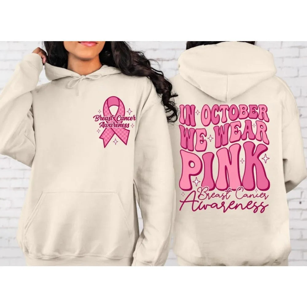Women's pink breast cancer awareness hoodie with art retro pattern and side seam pockets.