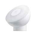 White modern bedside table lamp with human body induction and Bluetooth.