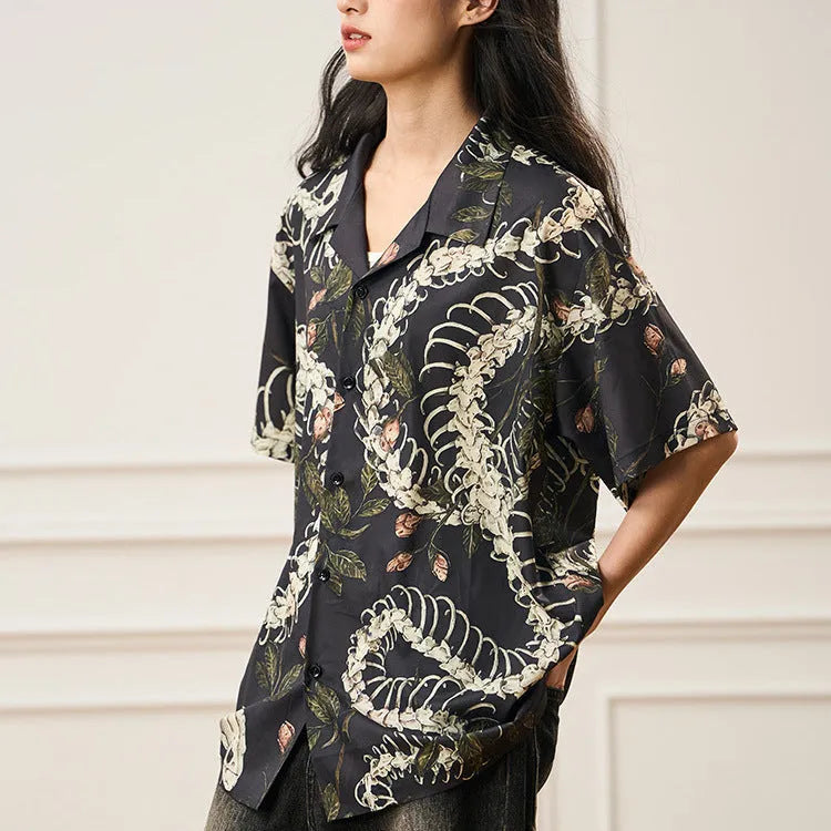 Short sleeve Cuban collar shirt with snake bone and floral pattern in a colour block style.